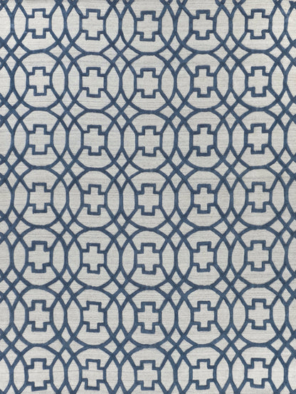 Blue geometric lattice pattern with interlocking circles and square centers on a light gray rug.