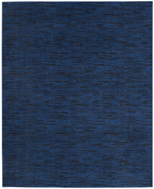 Rectangular navy blue rug with a subtle heathered texture and darker streaks for a modern, versatile floor look.