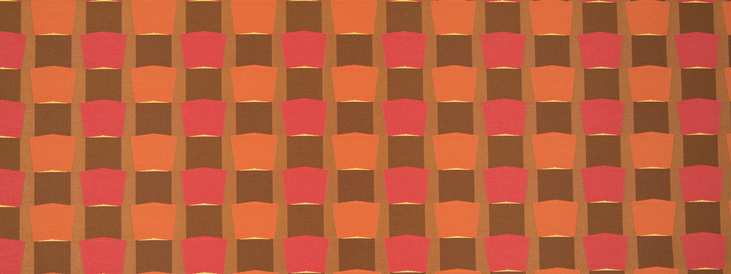 Orange, brown and pink checkerboard pattern with rounded-square blocks; retro textile design.