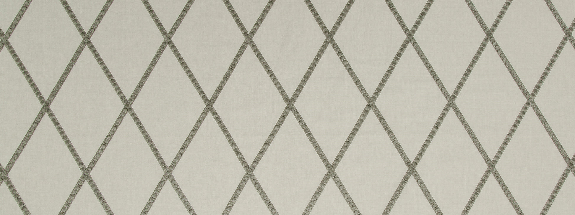 Cream wallpaper with a gray diamond lattice pattern.