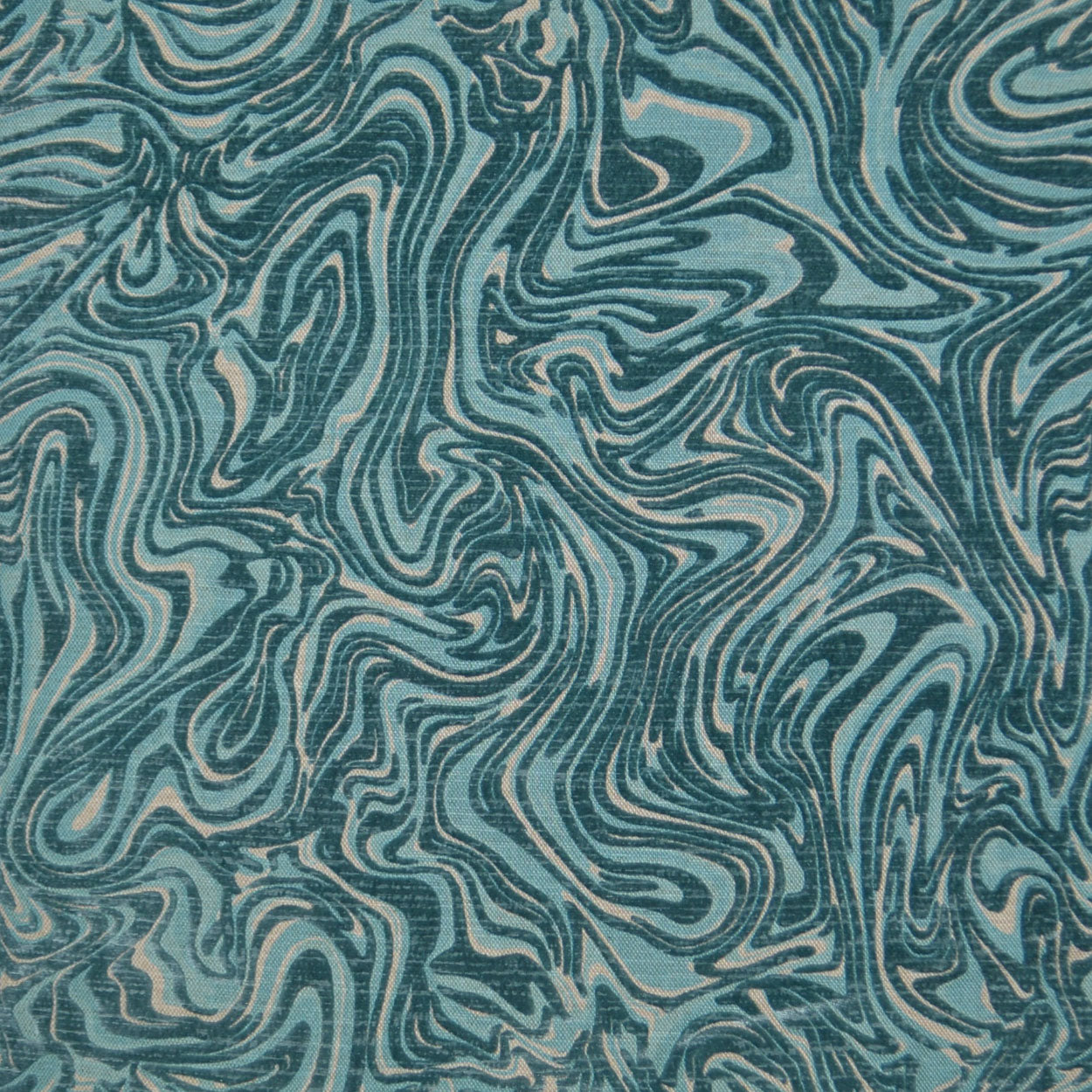 Teal & navy marbled fabric with cream swirls; abstract flowing pattern for upholstery or apparel.