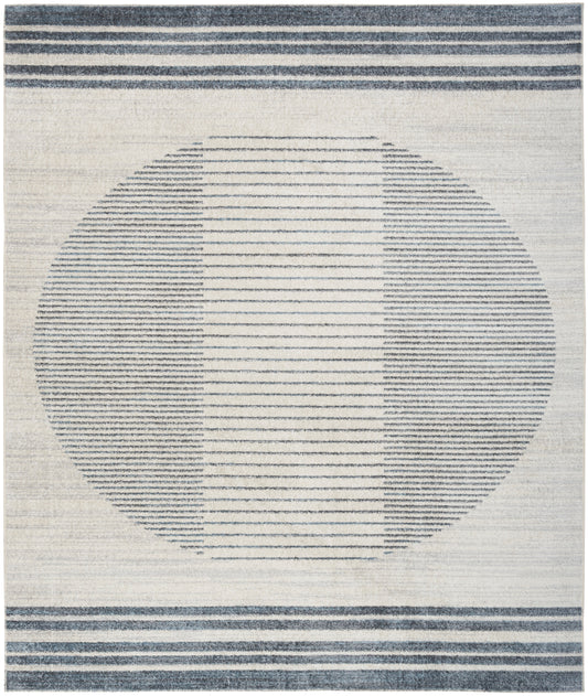 Cream flatweave rug featuring a large navy circle made of horizontal lines, with navy top and bottom borders.