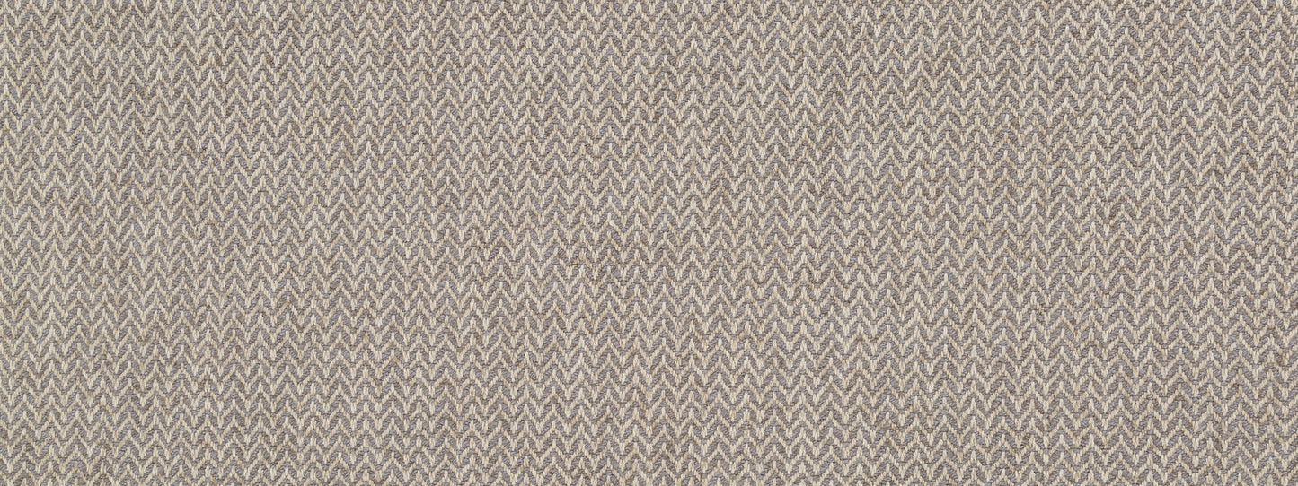 Beige knit fabric with subtle chevron/herringbone pattern in taupe; soft, textured textile for upholstery.