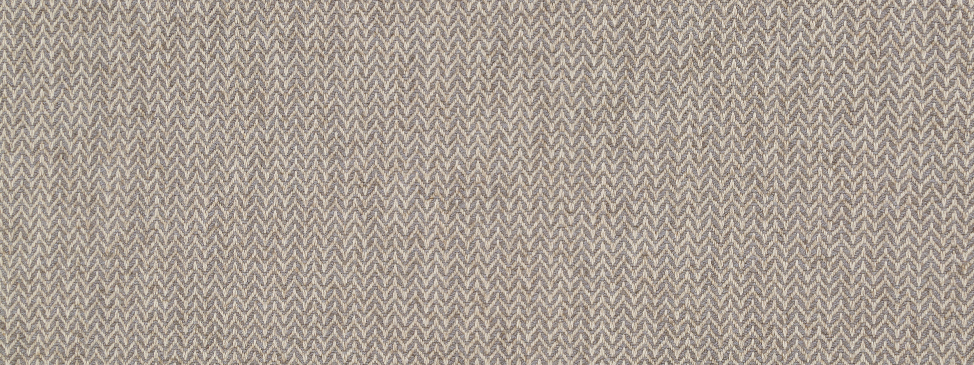 Beige knit fabric with subtle chevron/herringbone pattern in taupe; soft, textured textile for upholstery.
