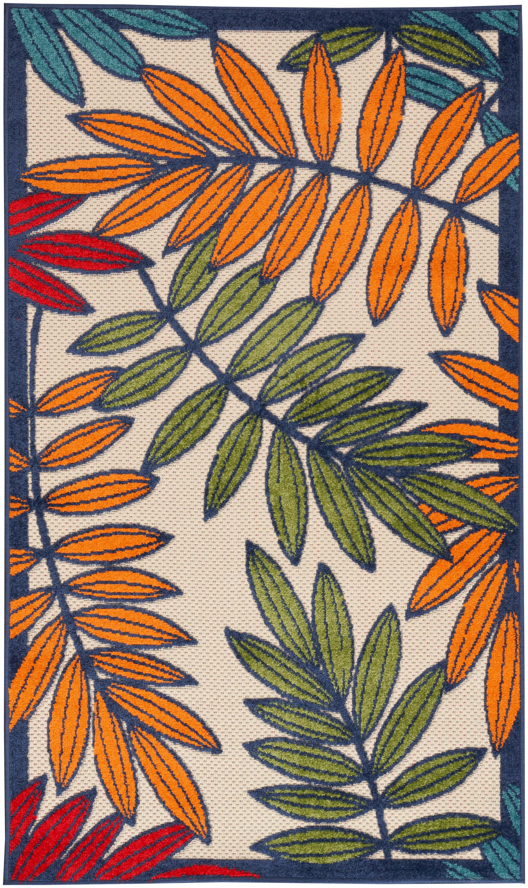 Rectangular textured rug with bold tropical leaves in orange, green, and red on beige, edged in navy
