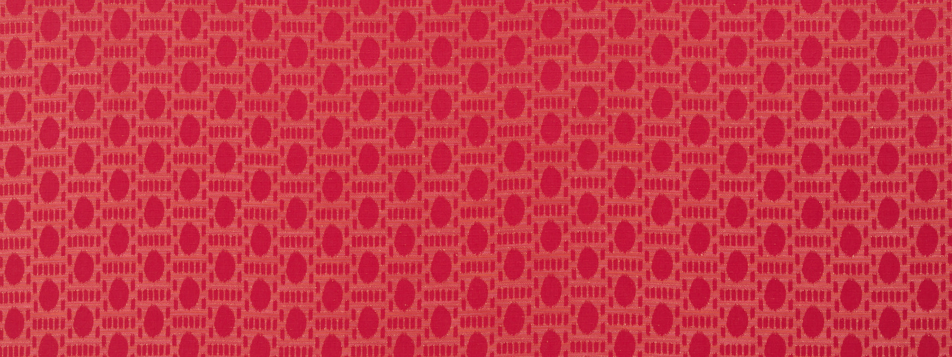 Red fabric with repeating pink circular ring pattern forming a geometric lattice; ideal for upholstery or fashion.