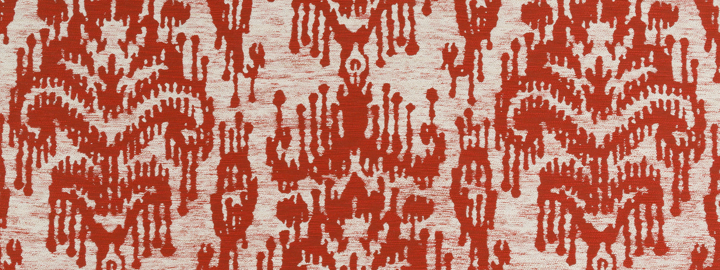 Painted Ikat pattern in Henna red on beige upholstery fabric; decorative textile for furniture or wall decor.