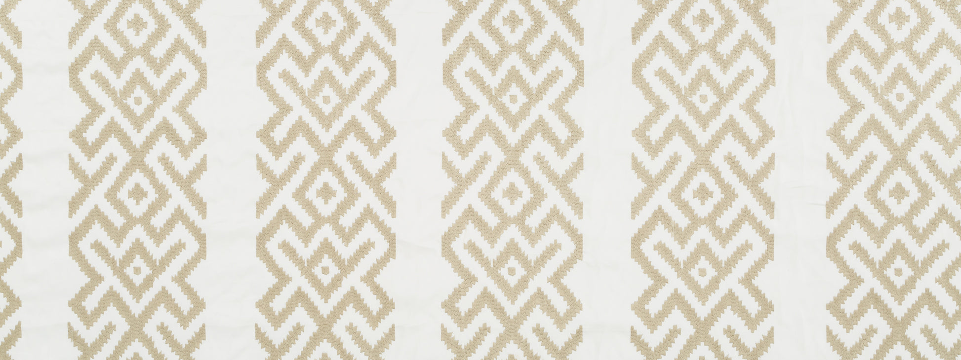 Beige geometric lattice pattern on cream backdrop; repeating diamond motifs for wallpaper or fabric.