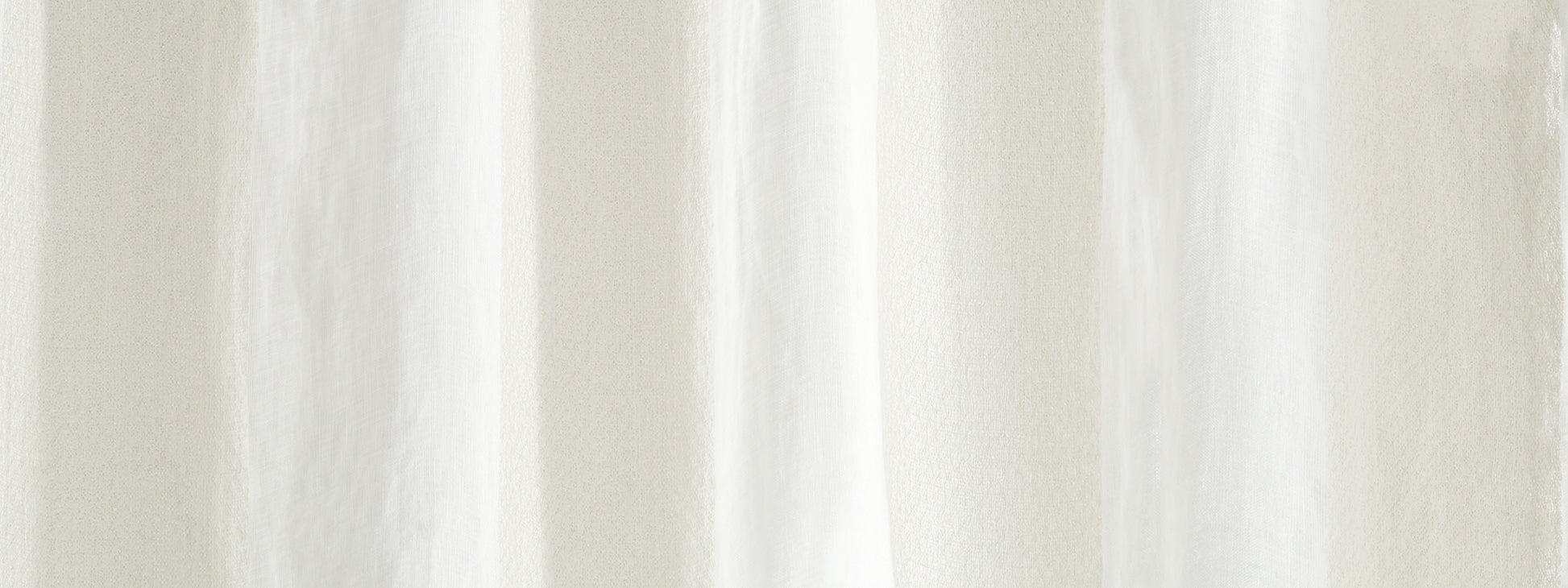 White sheer curtain panels with soft vertical folds, lightweight fabric for diffused natural light.