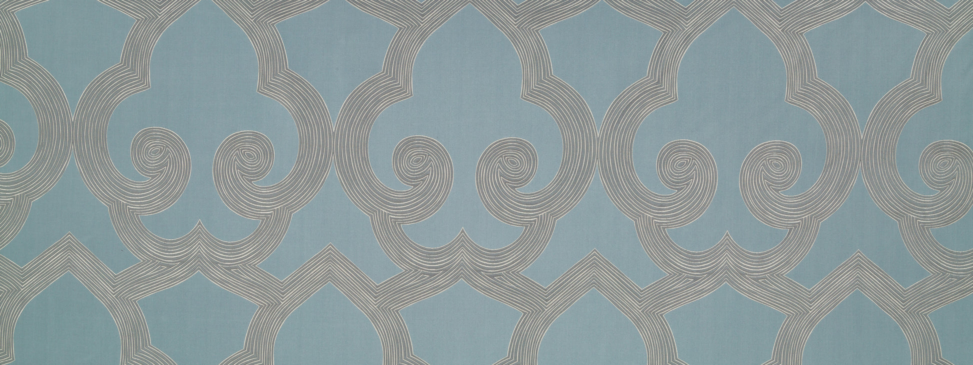 Teal wallpaper featuring cream concentric scrolls and interlocking arches; modern geometric pattern.