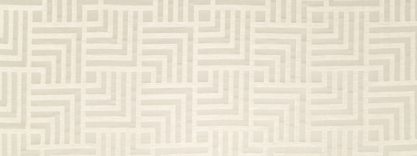 Beige drapery fabric with a subtle interlocking square maze pattern in neutral tones.