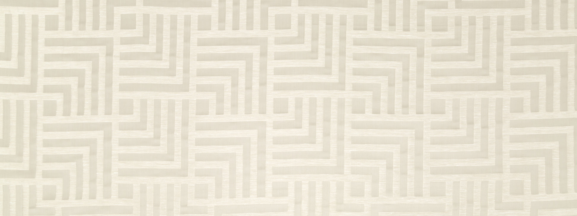 Beige drapery fabric with a subtle interlocking square maze pattern in neutral tones.