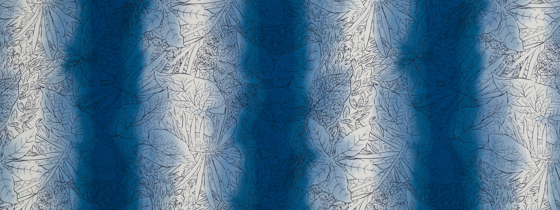 Blue & white batik-style fabric with leaf motif & vertical gradient stripes; lightweight textile for scarf or curtain.
