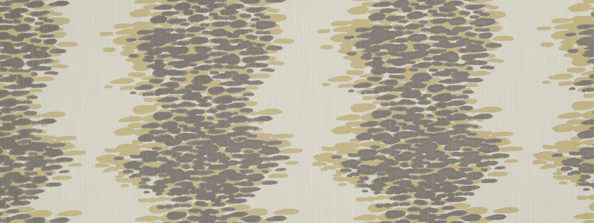 Beige fabric with vertical columns of charcoal pebble shapes; abstract woven textile for upholstery or curtains.