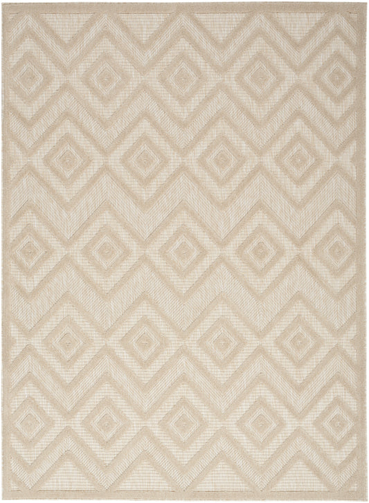 Beige woven area rug with repeating diamond and chevron geometric pattern and subtle textured weave.