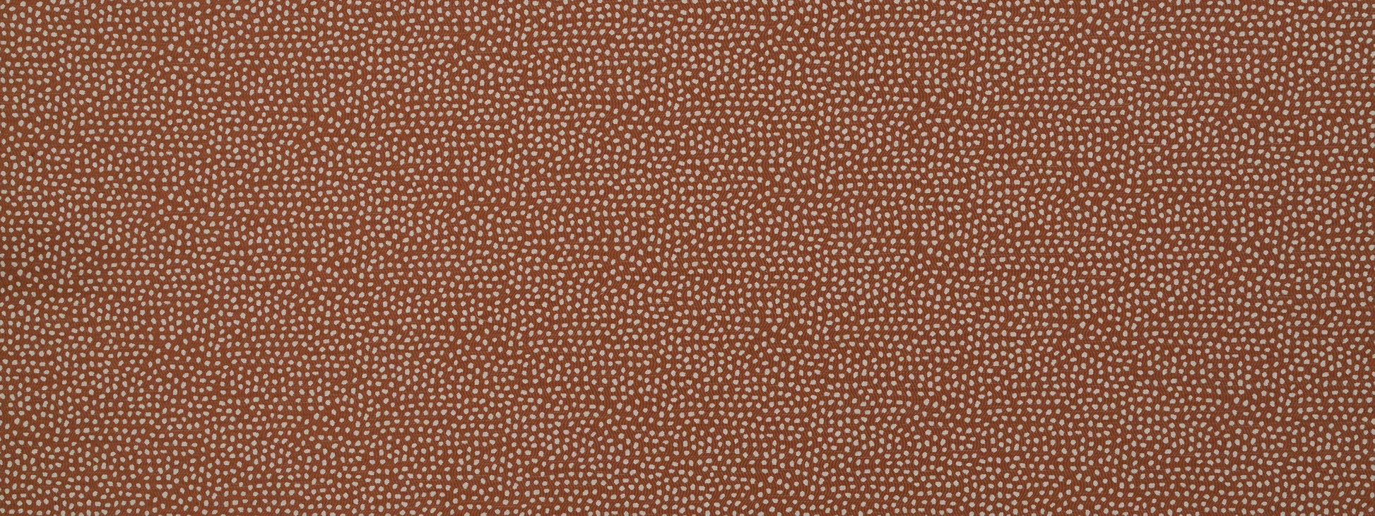 Brown tweed-like fabric texture with tiny white specks; woven material for apparel or upholstery.