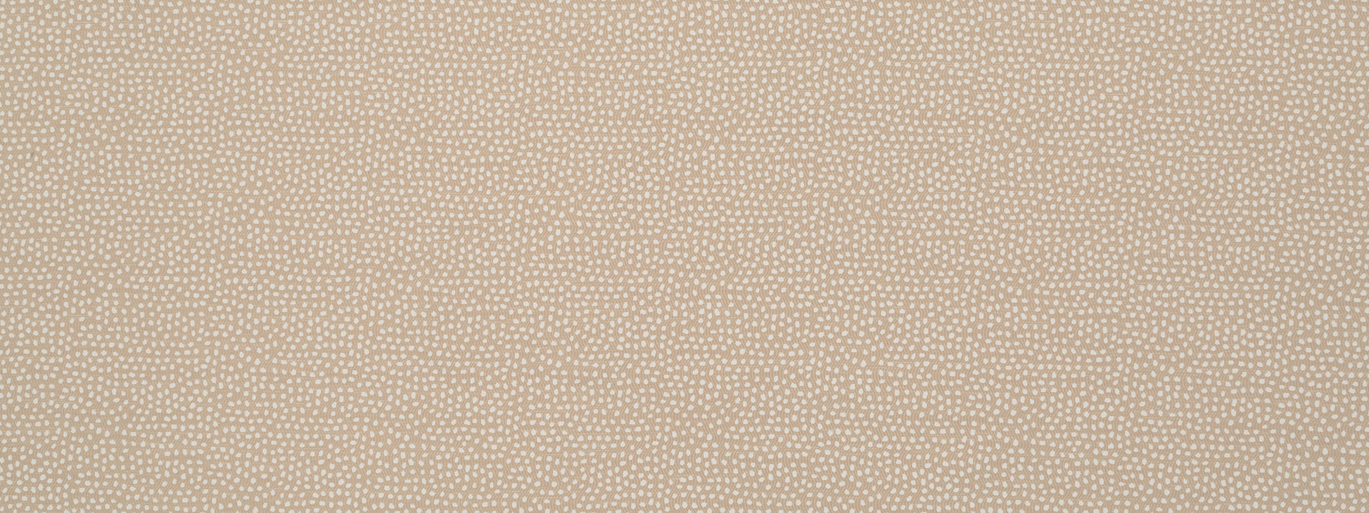 Beige dotted fabric close-up; soft woven texture with tiny white specks.