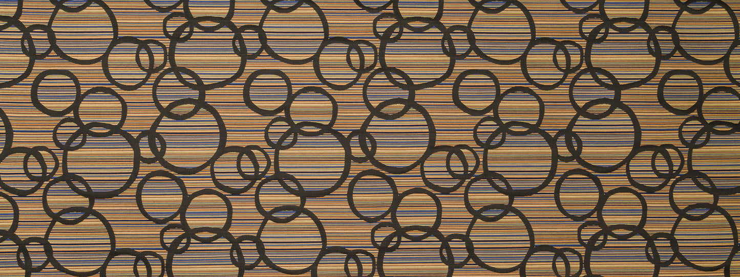 Dark interlocking rings pattern on a warm brown upholstery fabric background.