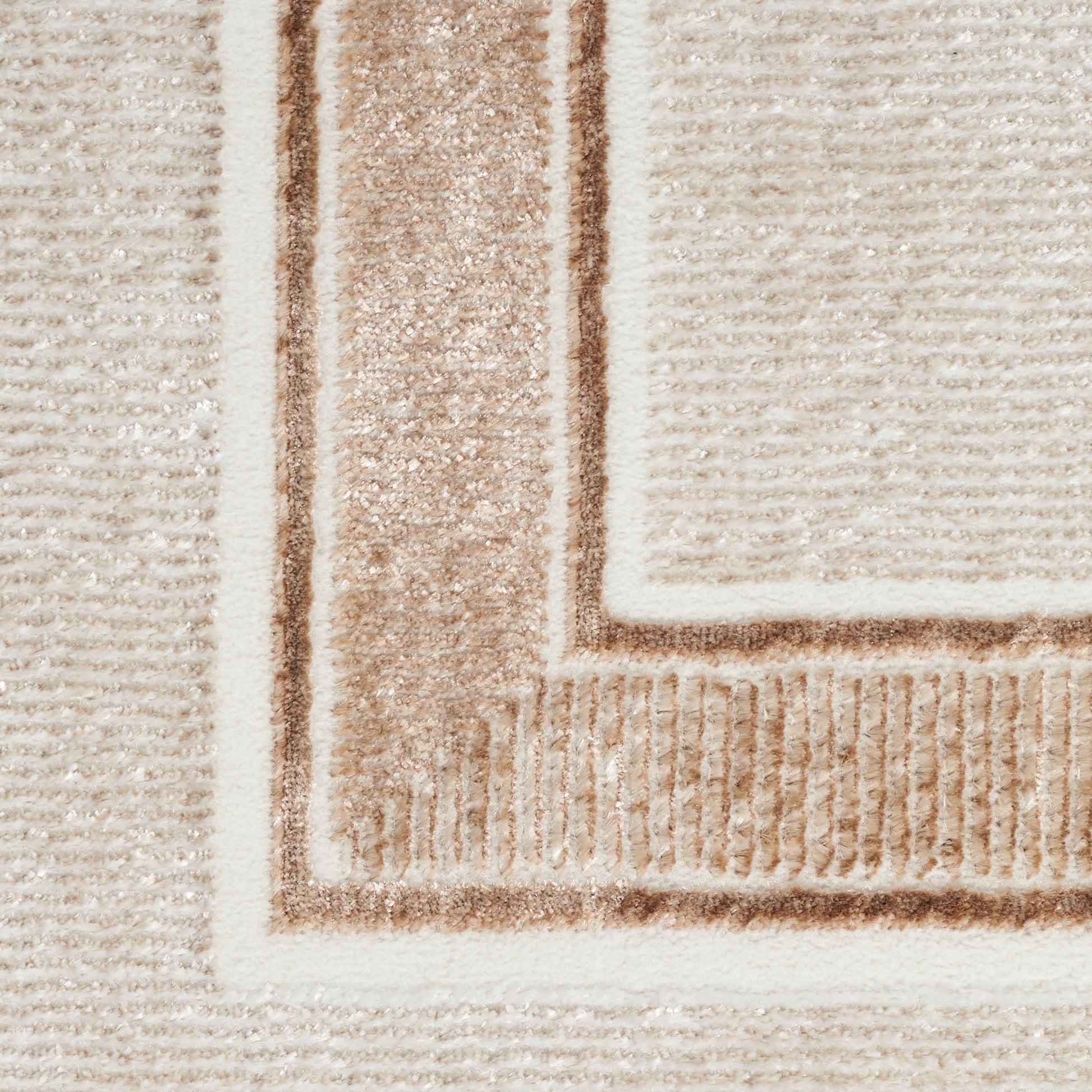 Beige runner rug with cream and light brown geometric border; textured woven surface and ribbed inner frame.