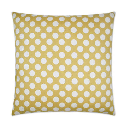 Square yellow pillow with white polka dots.