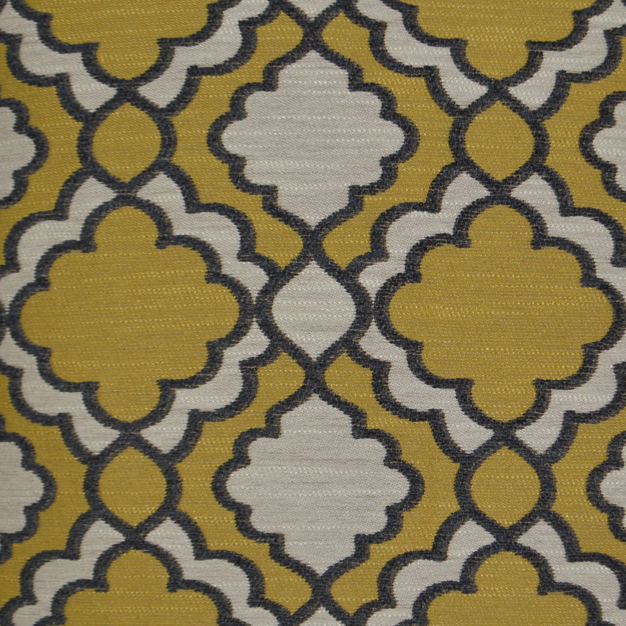 Pillow with geometric Moroccan trellis pattern in mustard yellow, pale gray quatrefoils and dark navy outlines; 24" x 24".