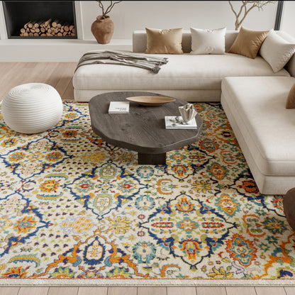 Multicolor oriental-style area rug with cream background and blue, teal, and orange motifs in a modern living room.