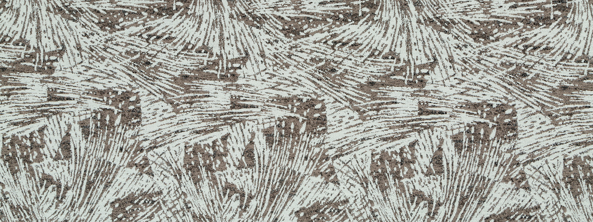 Gray fabric with mottled burst pattern; textured upholstery material.
