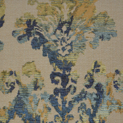 Beige woven fabric pillow with blue, teal and gold damask floral pattern; vintage textile.