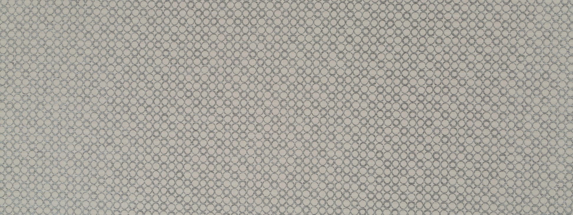 Beige textured upholstery fabric swatch with a tiny circular pattern and subtle woven texture.