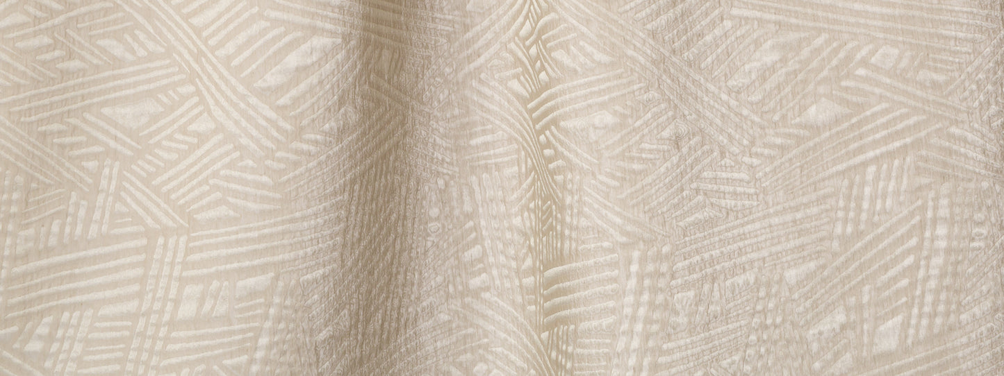 Beige woven fabric with geometric linear pattern; textured jacquard textile in cream tones for upholstery or curtains.