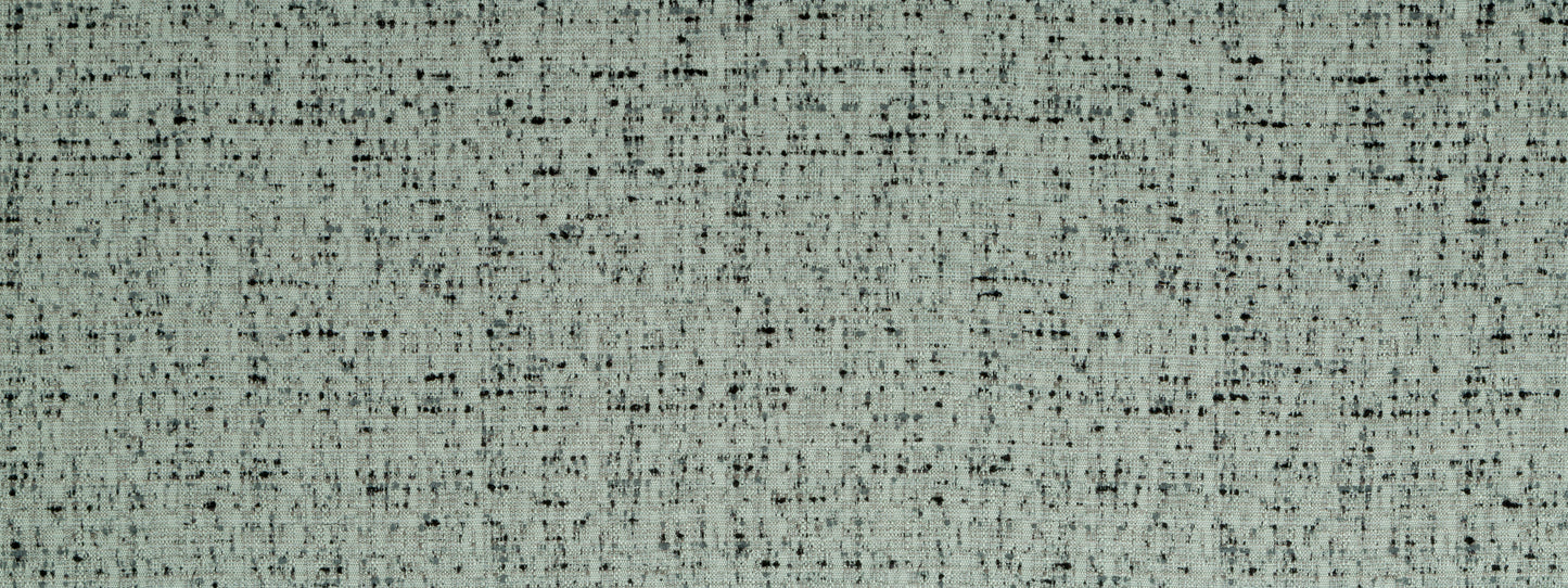 Sage-green tweed-style woven fabric texture with black flecks, upholstery-like textile.
