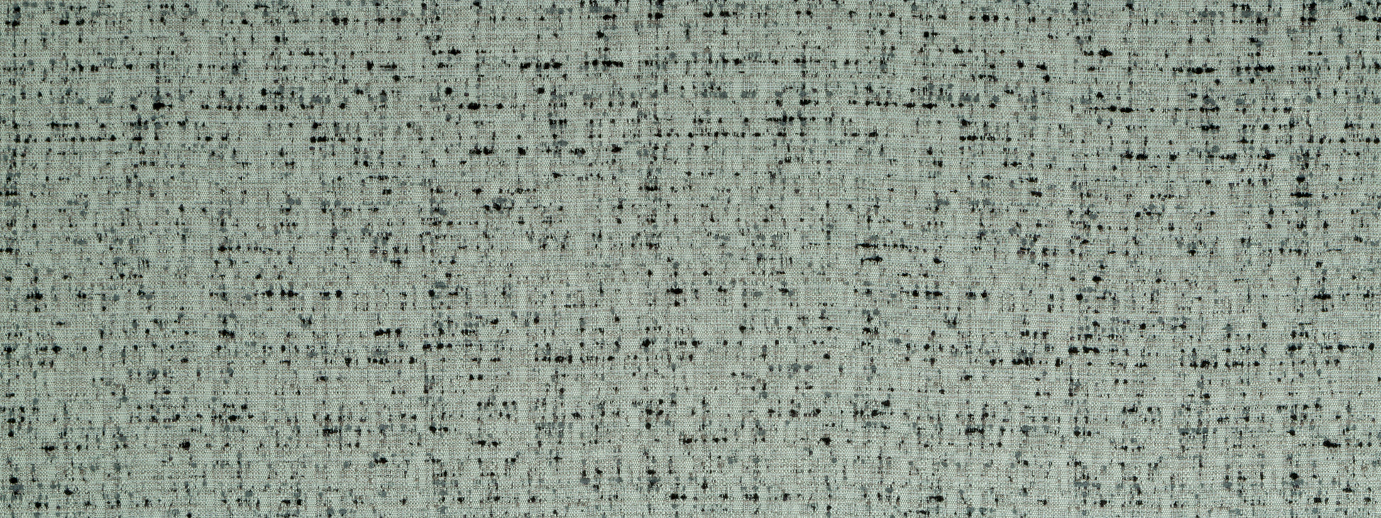 Sage-green tweed-style woven fabric texture with black flecks, upholstery-like textile.