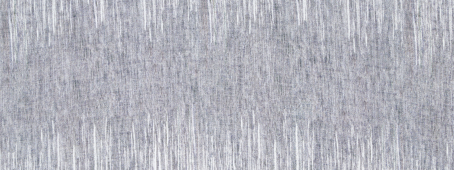 Close-up of indigo drapery fabric with subtle white vertical streaks; woven texture suitable for curtains.