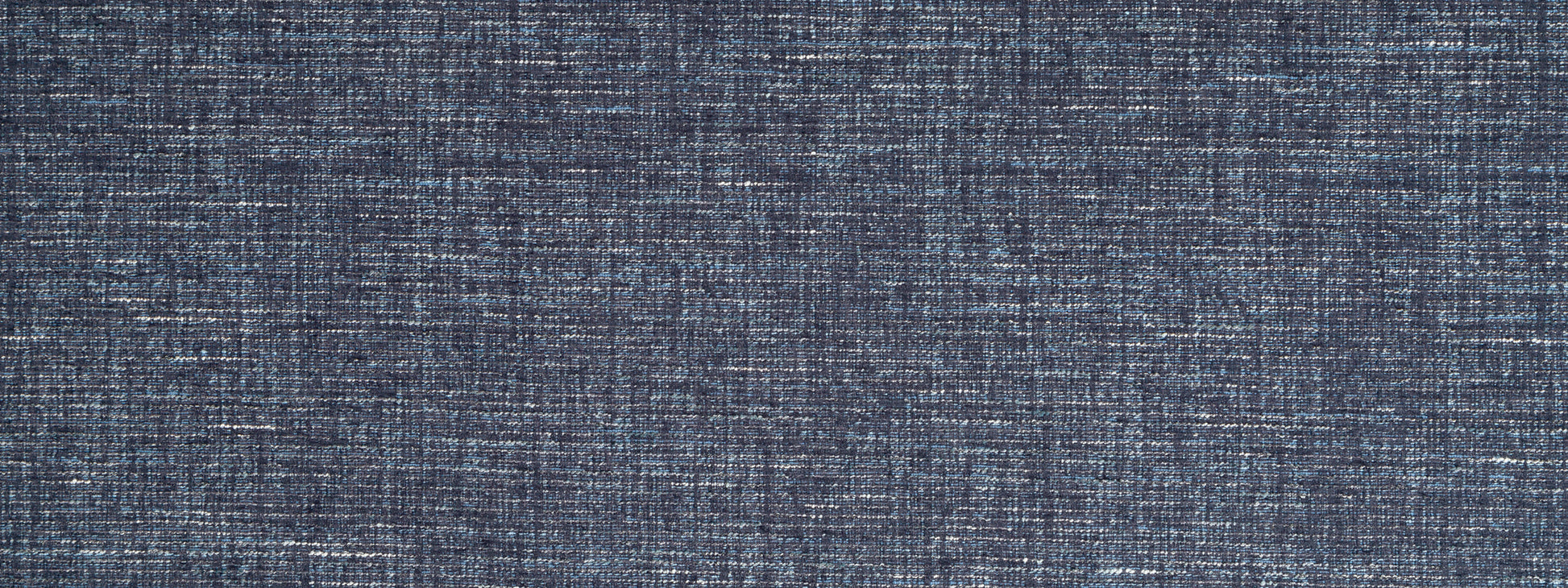 Blue denim-like fabric texture with visible woven threads, casual textile.