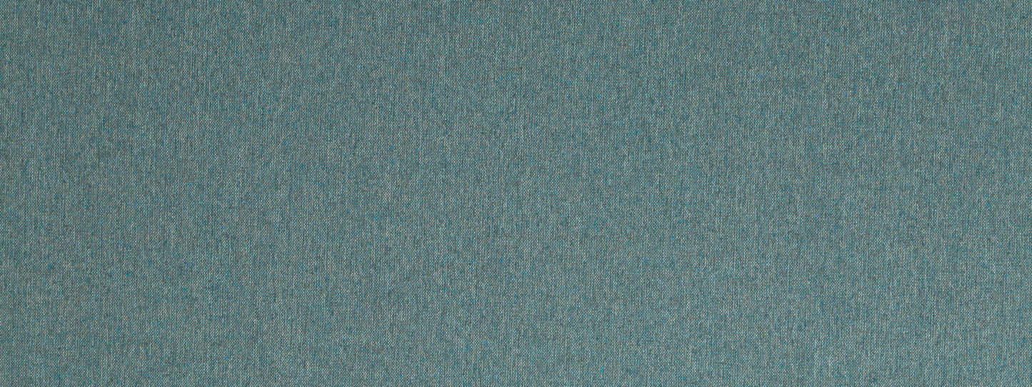 Close-up of teal-blue textured fabric with a subtle speckled pattern, suitable for upholstery or crafts.
