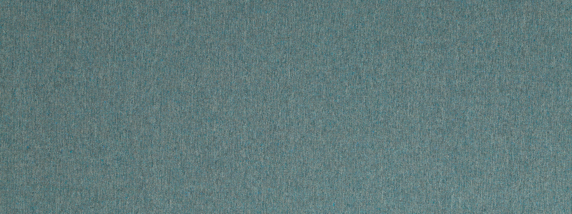 Close-up of teal-blue textured fabric with a subtle speckled pattern, suitable for upholstery or crafts.