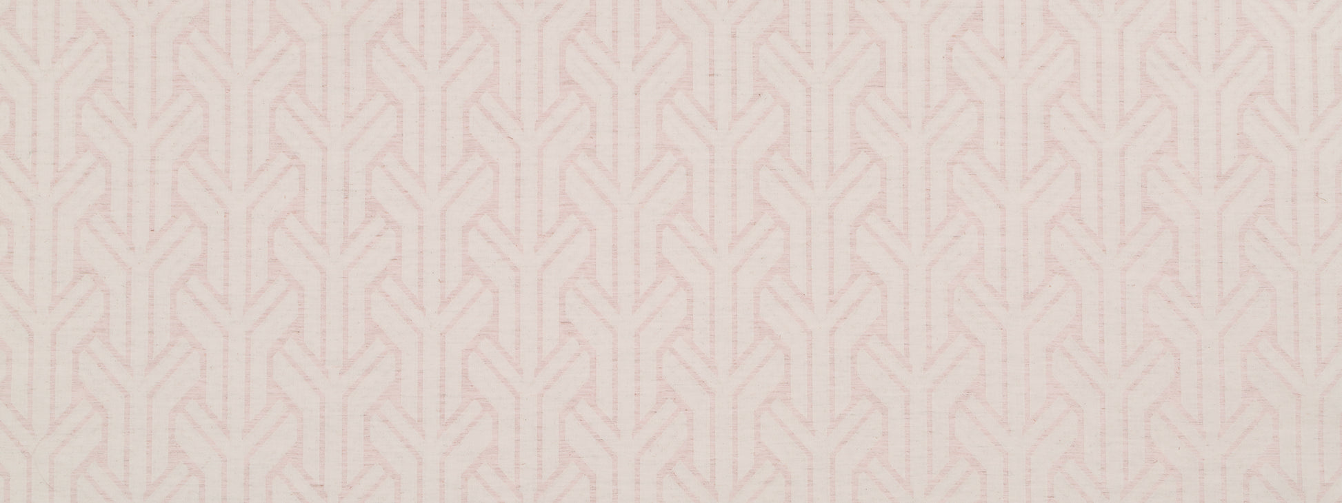 Soft pink upholstery fabric with a repeating pale-beige chevron lattice pattern.