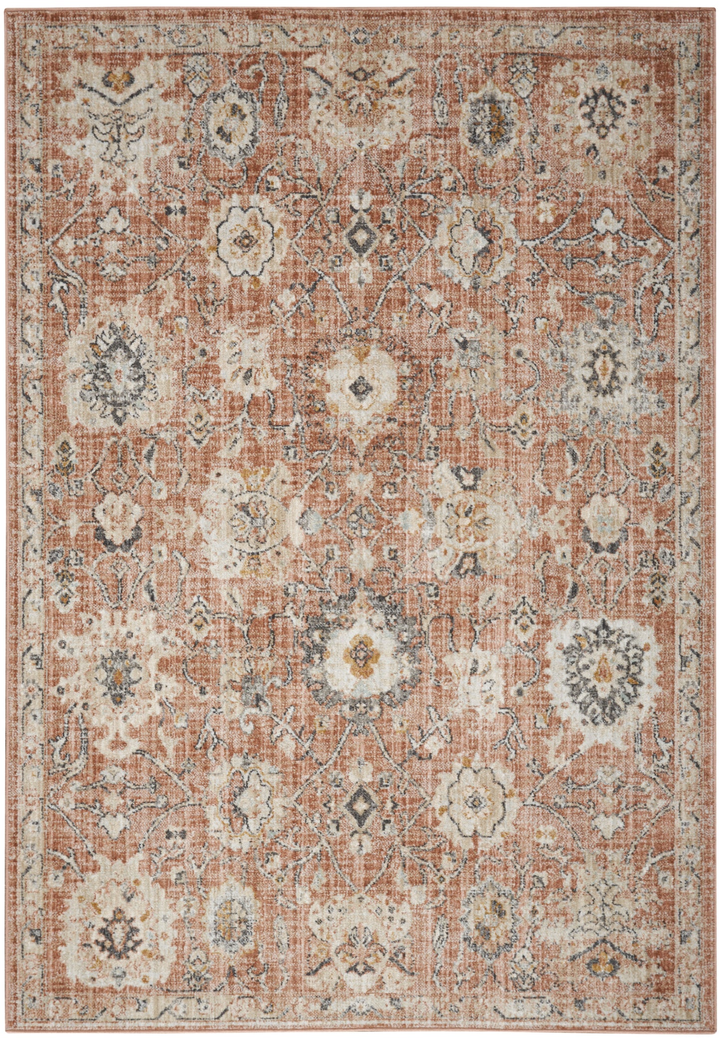 Rust-orange oriental area rug with ivory and blue floral medallions, distressed vintage look and bordered edges.
