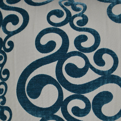 Teal blue swirling scroll damask pattern on ivory background; decorative 24x24 pillow.