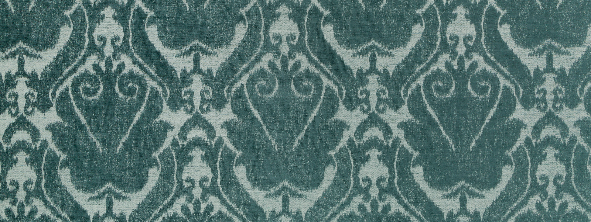 Teal damask patterned upholstery fabric with ornate scroll motifs.