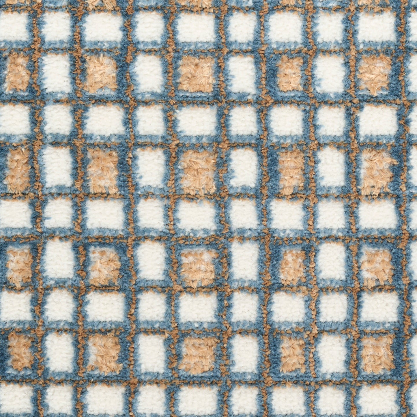 Blue-gray grid rug with white and tan square blocks; plush loop-pile texture and geometric checker pattern.