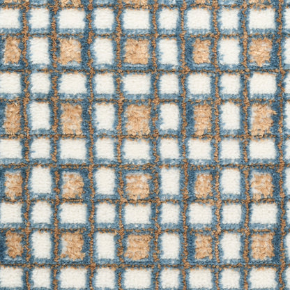 Blue-gray grid rug with white and tan square blocks; plush loop-pile texture and geometric checker pattern.