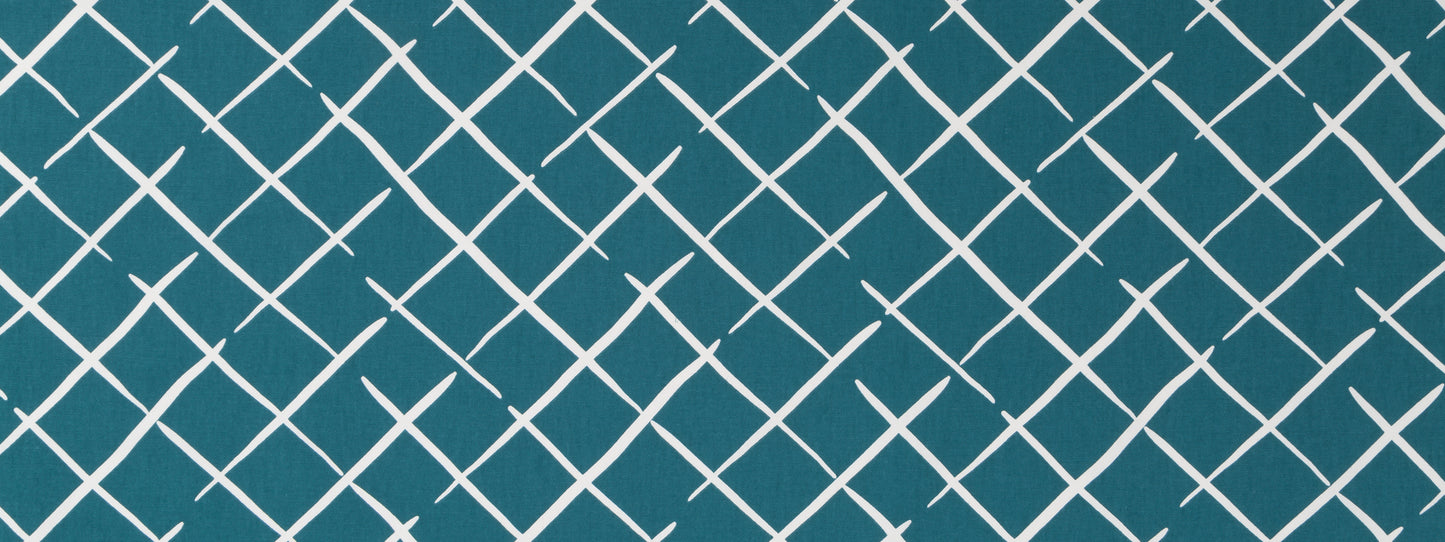 Teal fabric with white crisscross lattice pattern