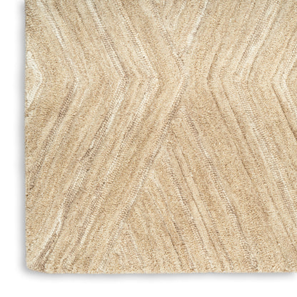 Beige textured rug with subtle chevron wave pattern and soft pile; neutral decor for living rooms.