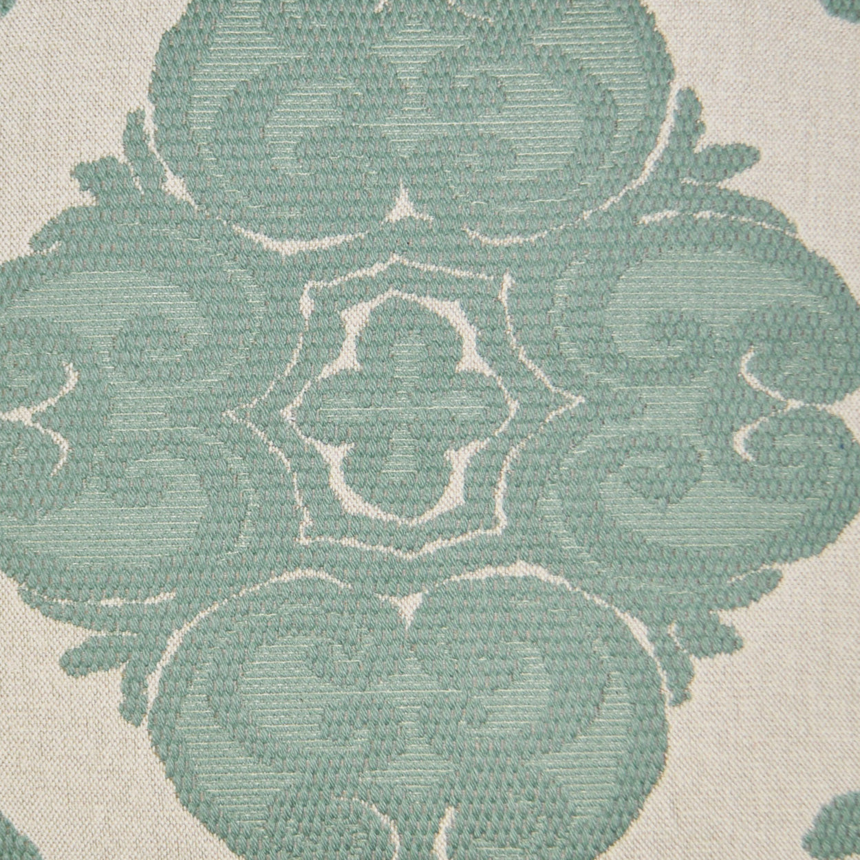 Teal damask jacquard upholstery fabric with cream background.
