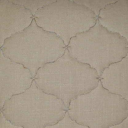 Sand-colored 24" x 24" pillow with beige woven fabric and subtle taupe scalloped quatrefoil lattice embroidery.