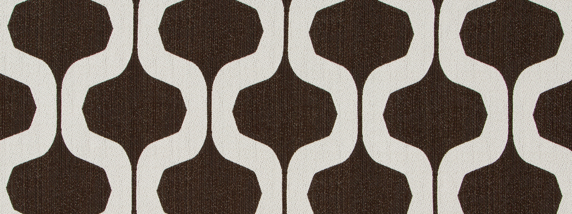 Dark brown interlocking rounded shapes on beige background; mid-century geometric upholstery fabric pattern.