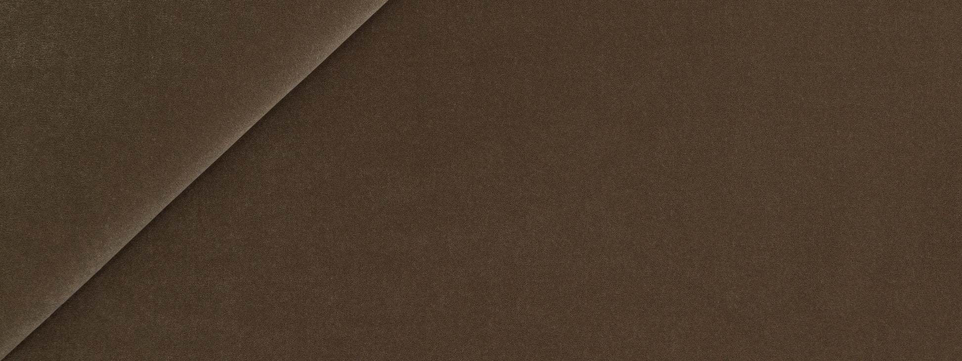 Close-up of Teak-colored material with a diagonal seam and smooth texture.