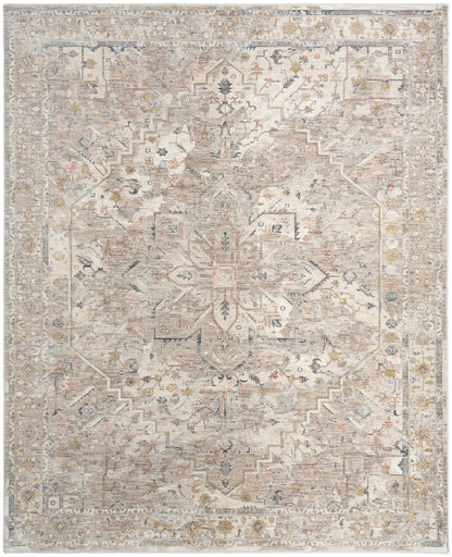 Neutral distressed area rug with central medallion, geometric floral motifs, in beige, ivory, gray and pale blue tones.