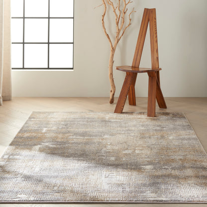 Beige textured area rug (6' x 9') on the floor in a sunlit room.
